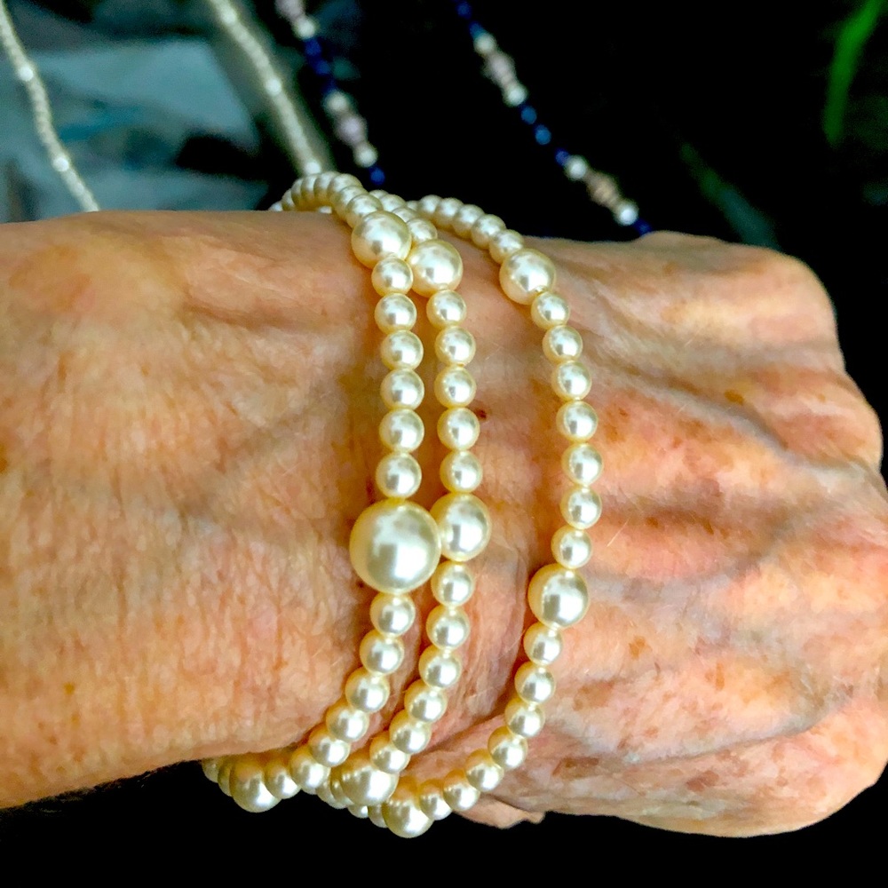 Creamy white 6mm and 8mm pearls to wear as a triple wrap bracelet or necklace.